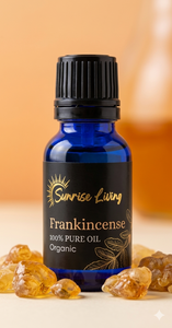 Bottle of Sunrise Living Frankincense oil with frankincense resin on a beige background