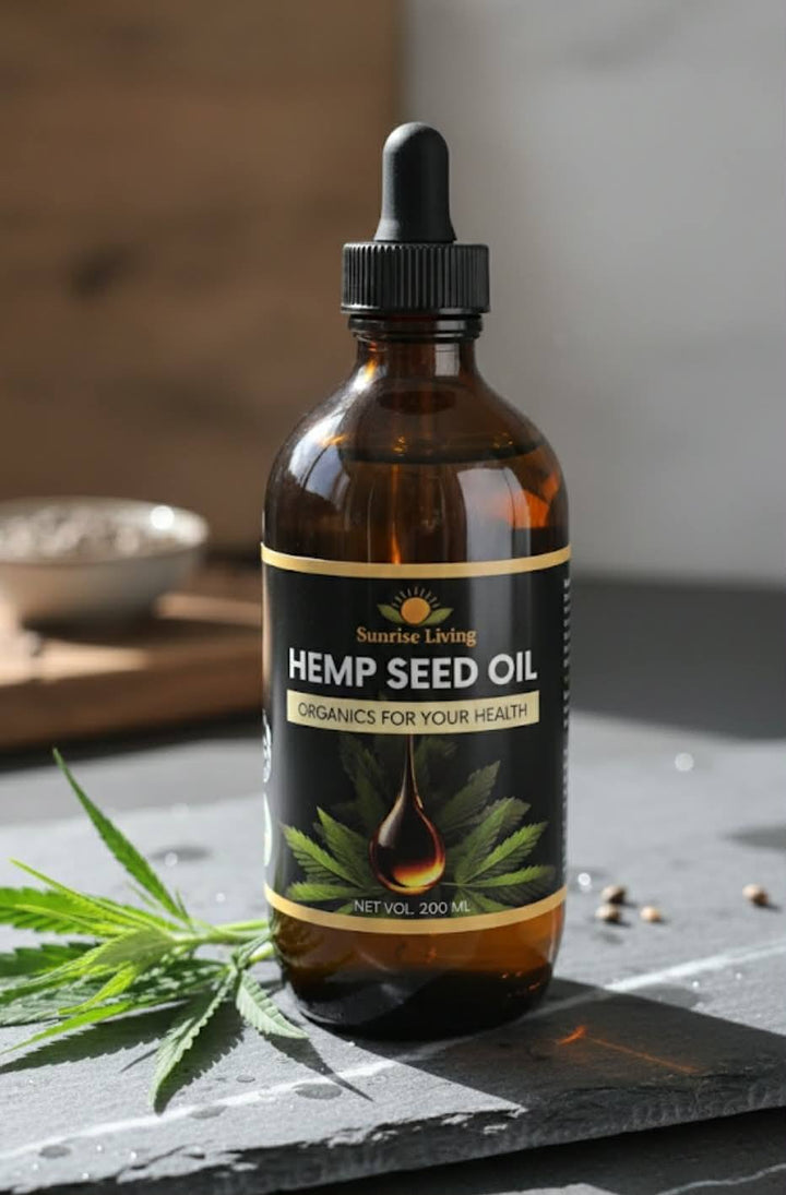 Bottle of Hemp Seed Oil with a dropper on a dark surface