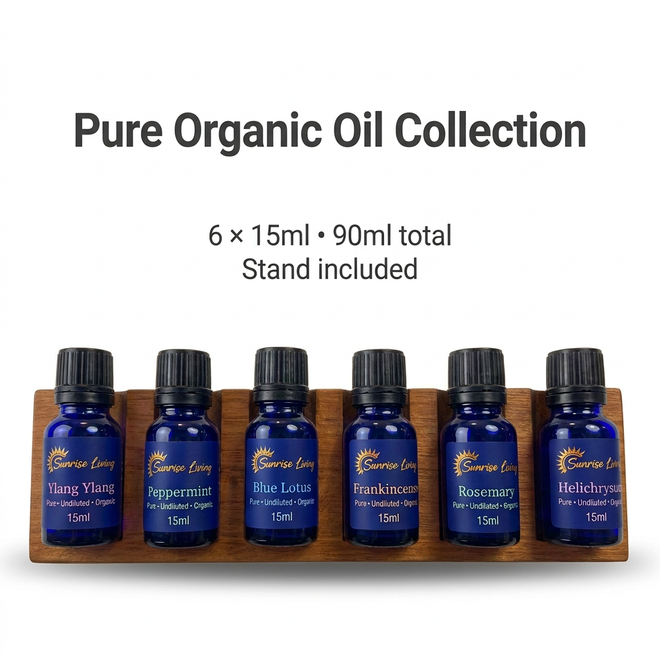 Six Sunrise Living 15ml organic oil bottles in a wooden stand on a clean white background, 90ml total.