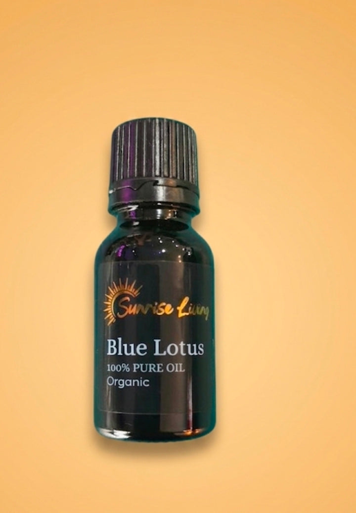 Bottle of Blue Lotus oil with a black cap on a beige background